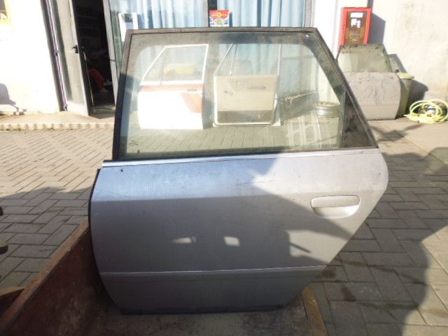Sportello porta portiera posteriore sinistro lato guida Audi A6 Avant