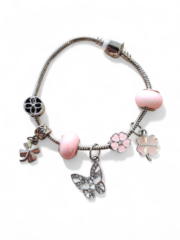 Pandora con dijes, en acero quirurgico