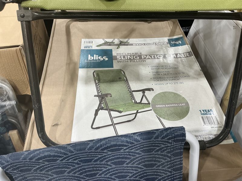 Sling patio chair with pillow