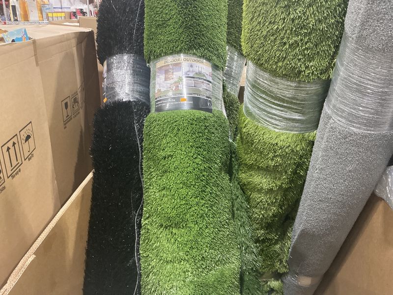Artificial grass area rug