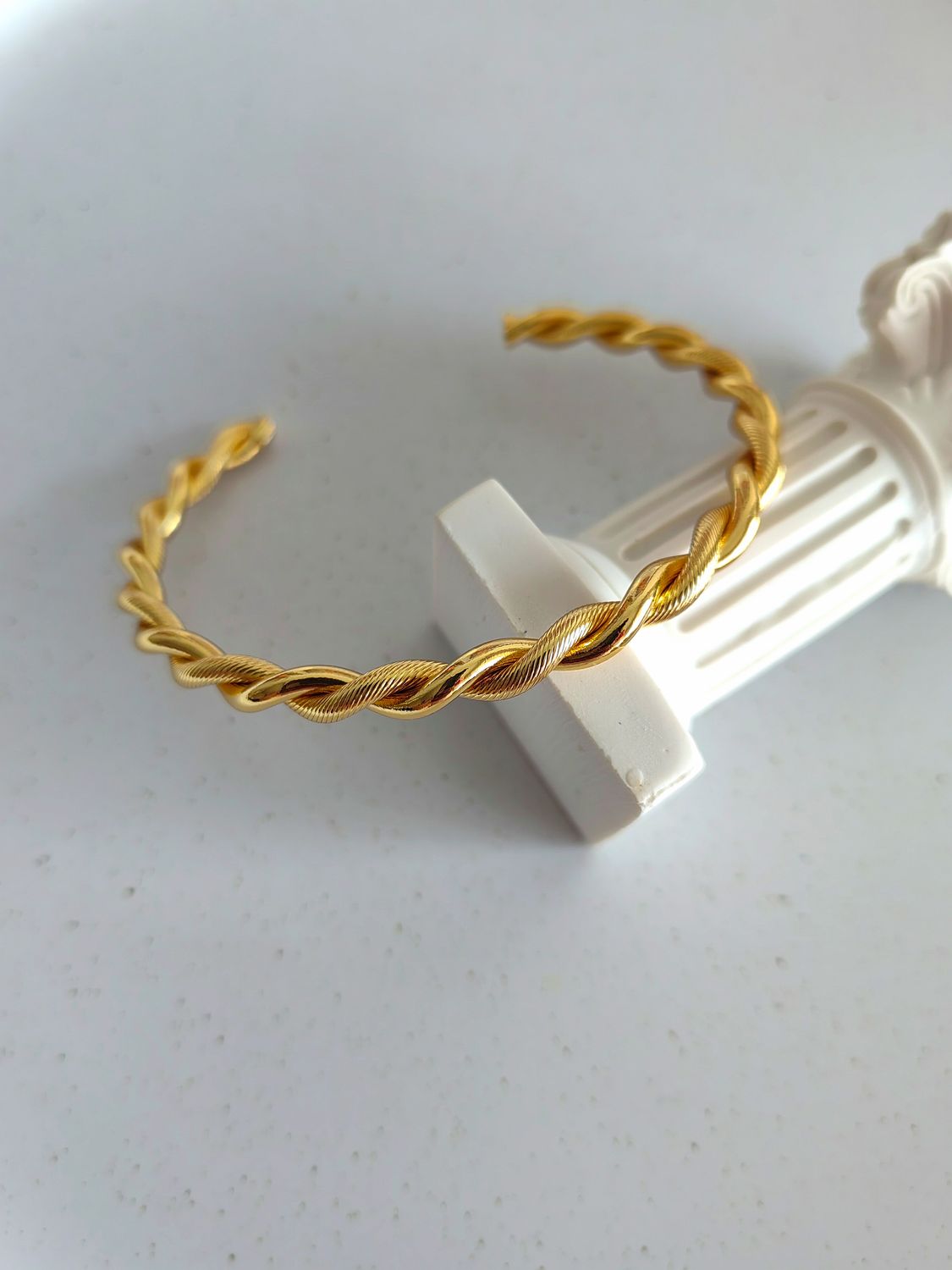 TWISTED BANGLE
