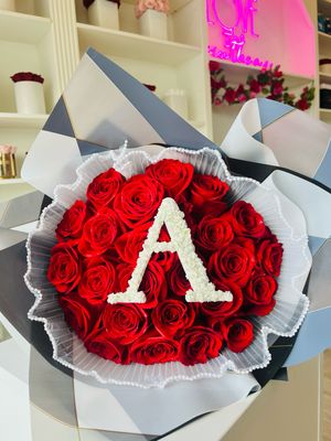 24 Roses Wrapped With Baby’s Breath Initial 🤍