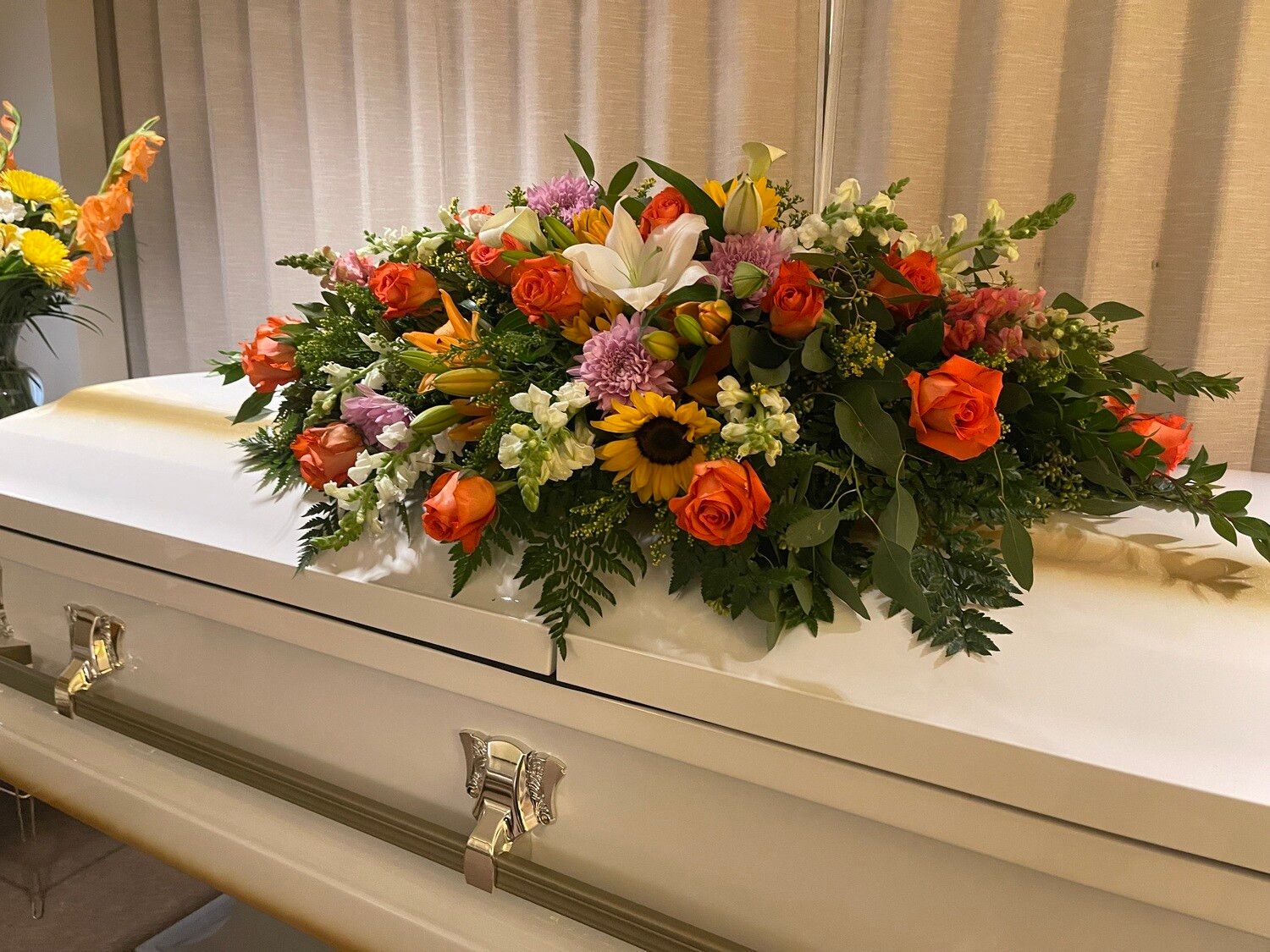 Orange rose mix spring casket piece
