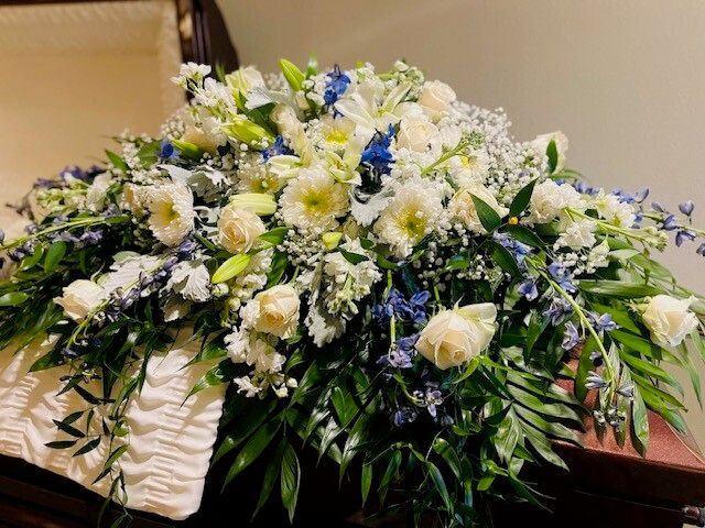 White and blue casket piece