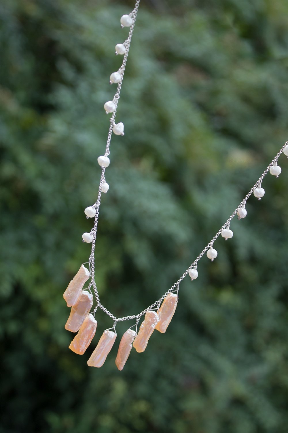 Tan long sea pearls, white pearls on sterling silver chain