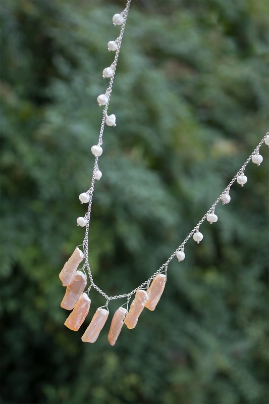 Tan long sea pearls, white pearls on sterling silver chain