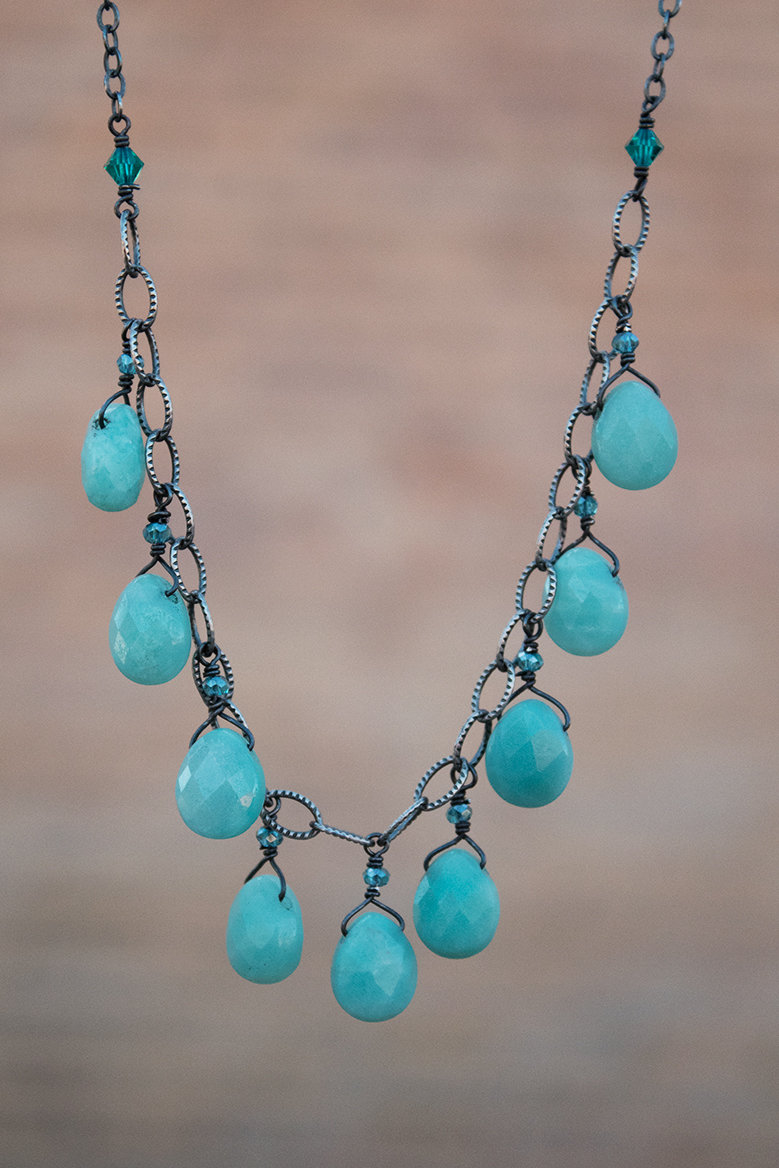 Faceted chalcedony, Swarovski crystals, oxidized sterling silver chain and findings