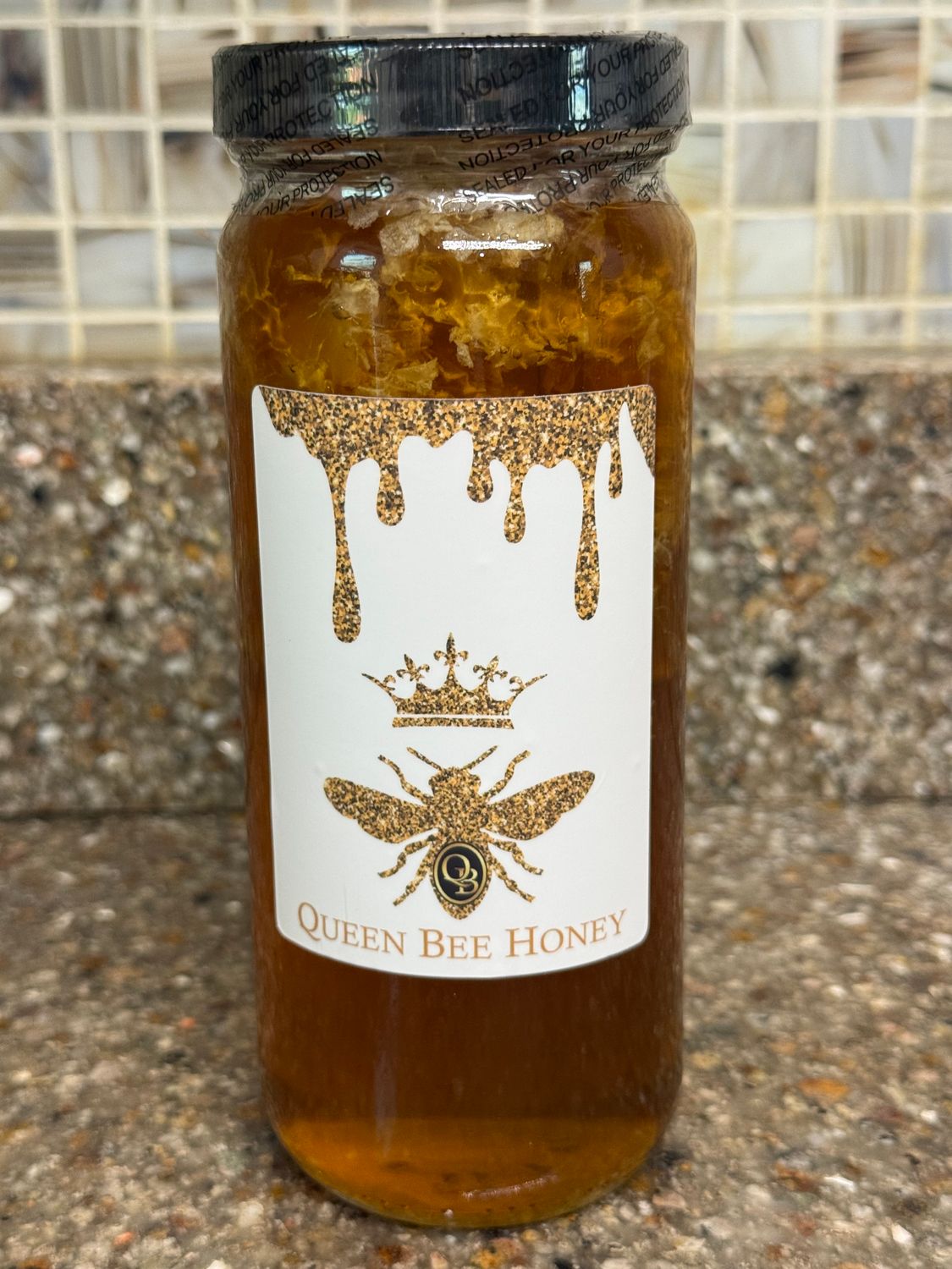 Queen Bee Honey w’ Honeycomb 16 oz