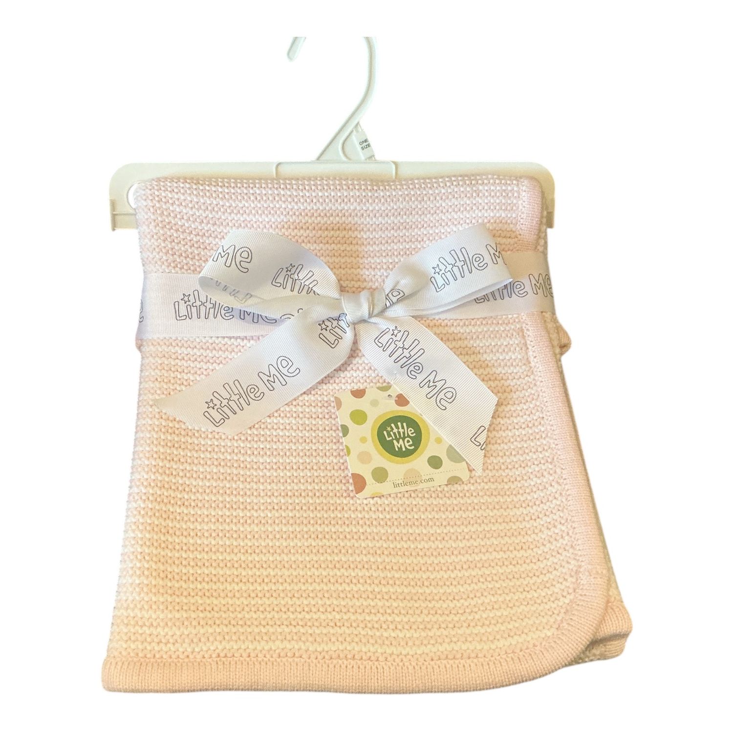 white/pink textured blanket