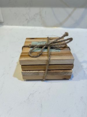 Set of 4 coasters w/ participants art work.