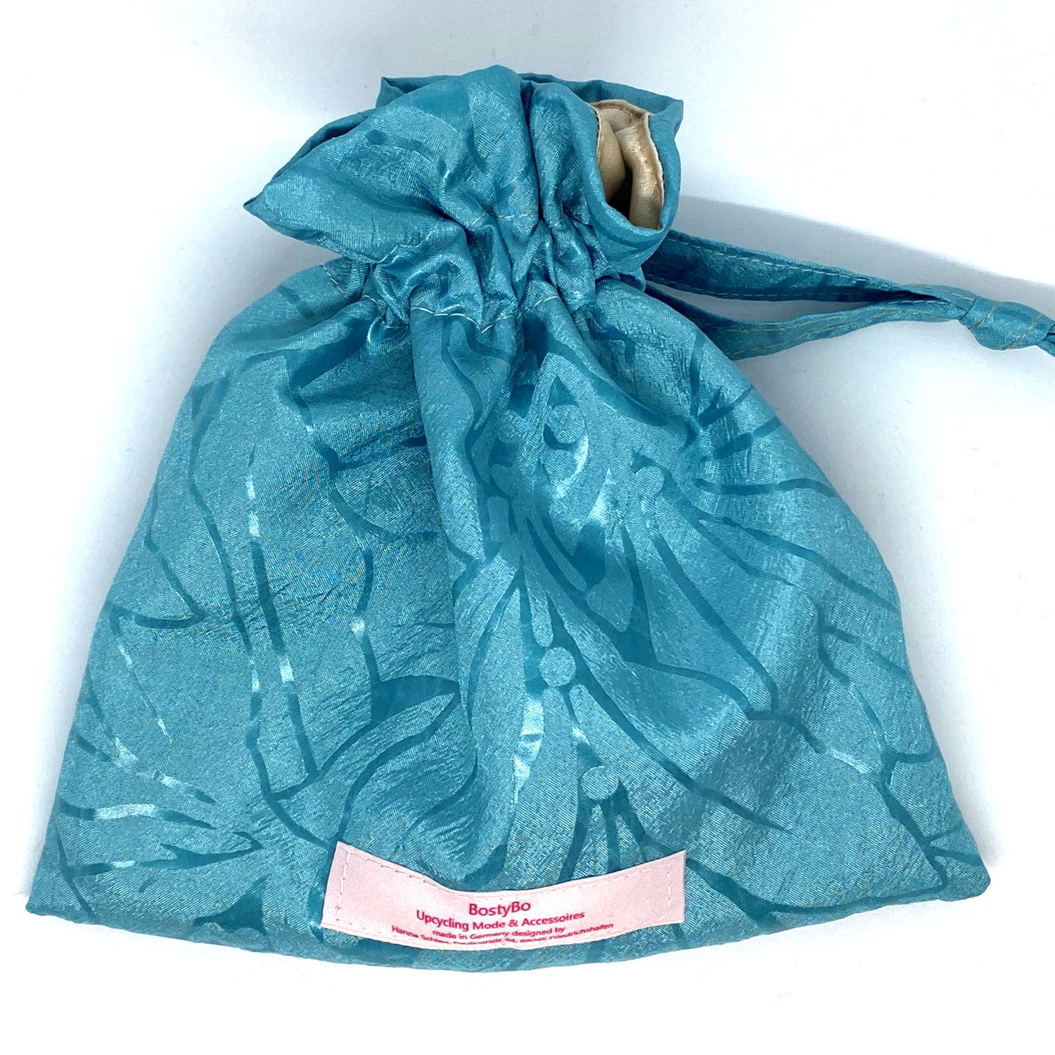 Wristlet/ Geschenkbeutel türkis mit goldfarbenem Futter