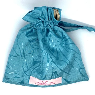 Wristlet/ Geschenkbeutel türkis mit goldfarbenem Futter