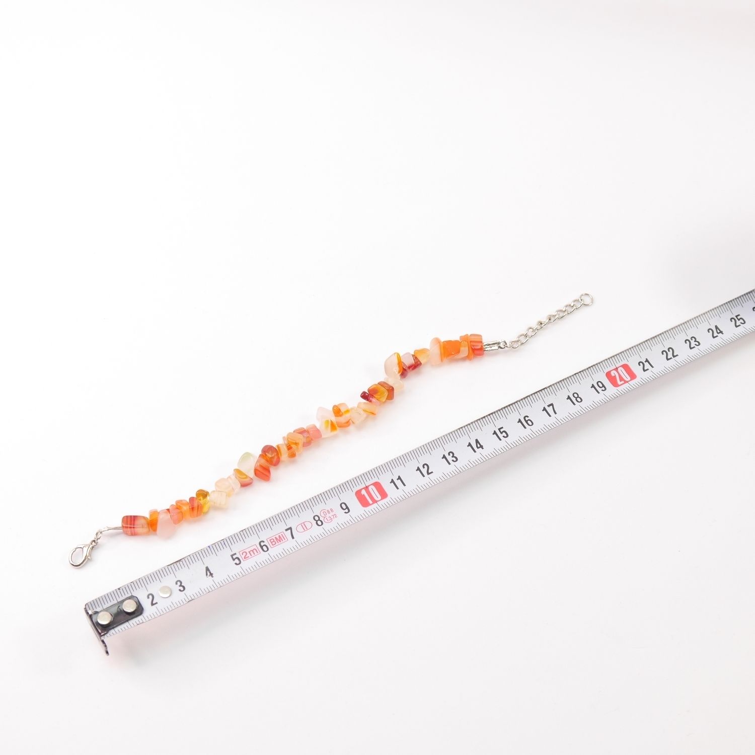Armband aus echten Natursteinen in warmen Orangetönen