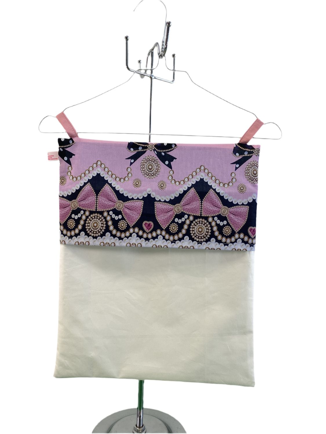 Wäschesammler mit Perlen-/ und Schleifenmotiv