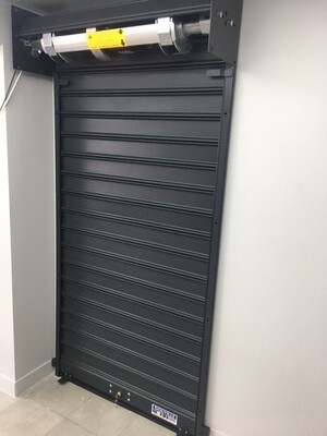 Butée de tirage  pour rideaux et grilles métalliques