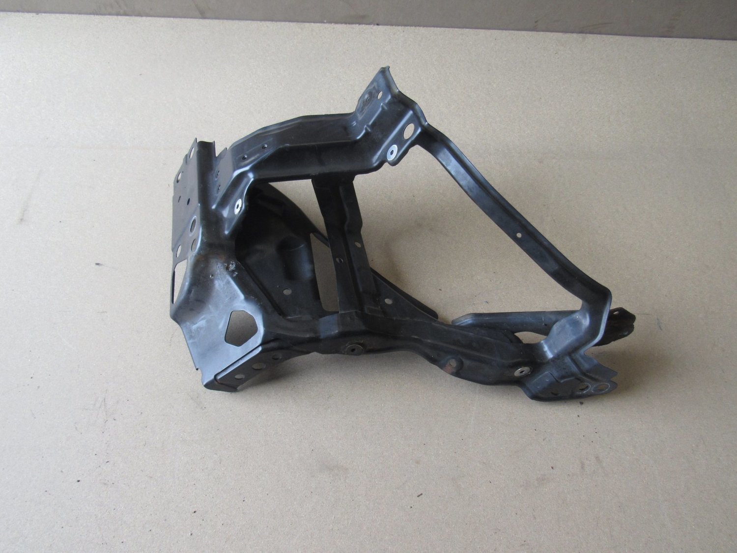 Nissan 350z 2004    Headlight Surround front Panel Bumper Support One side Only