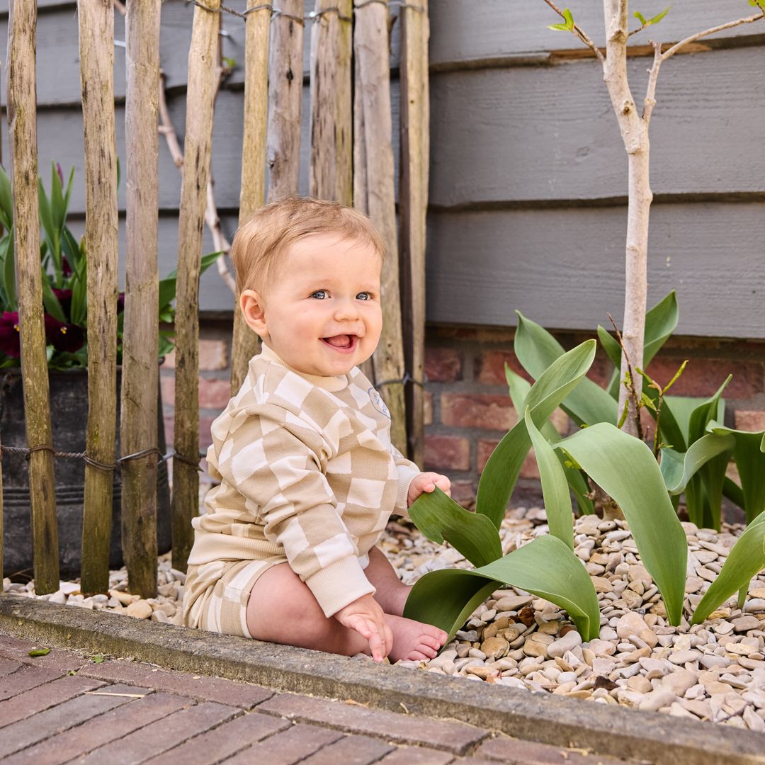 Dirkje jongens sweater loose fit off white zand geblokt