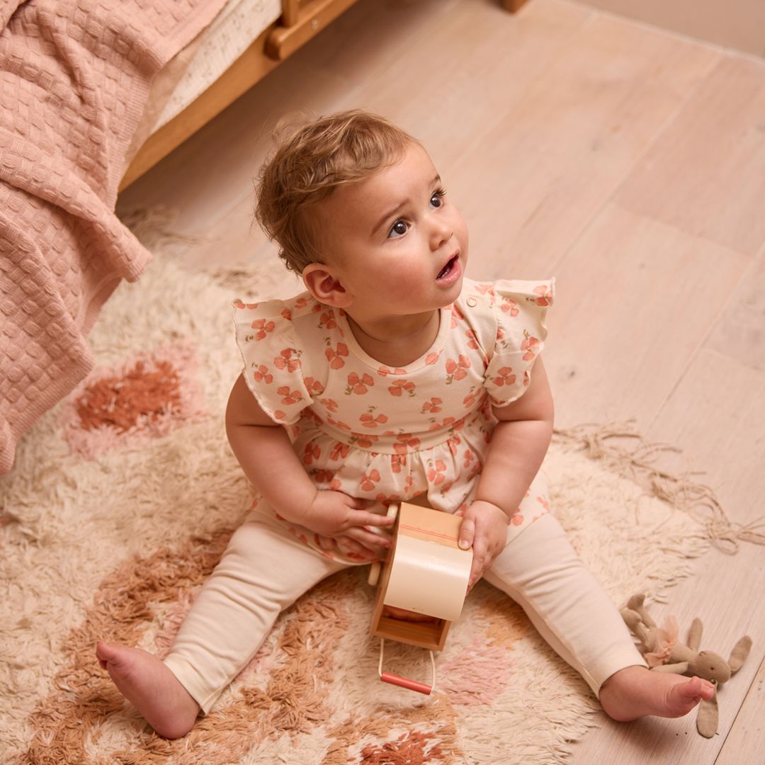 Dirkje meisjes set jurk off white bloem perzikoranje stip
