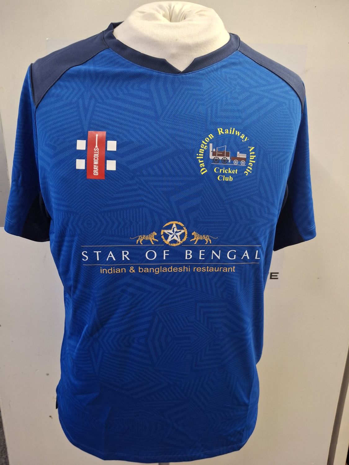 Darlington RA Junior Pro T20 Blue Short Sleeved Shirt Darlington RA Junior Pro T20 Blue Short Sleeved Shirt