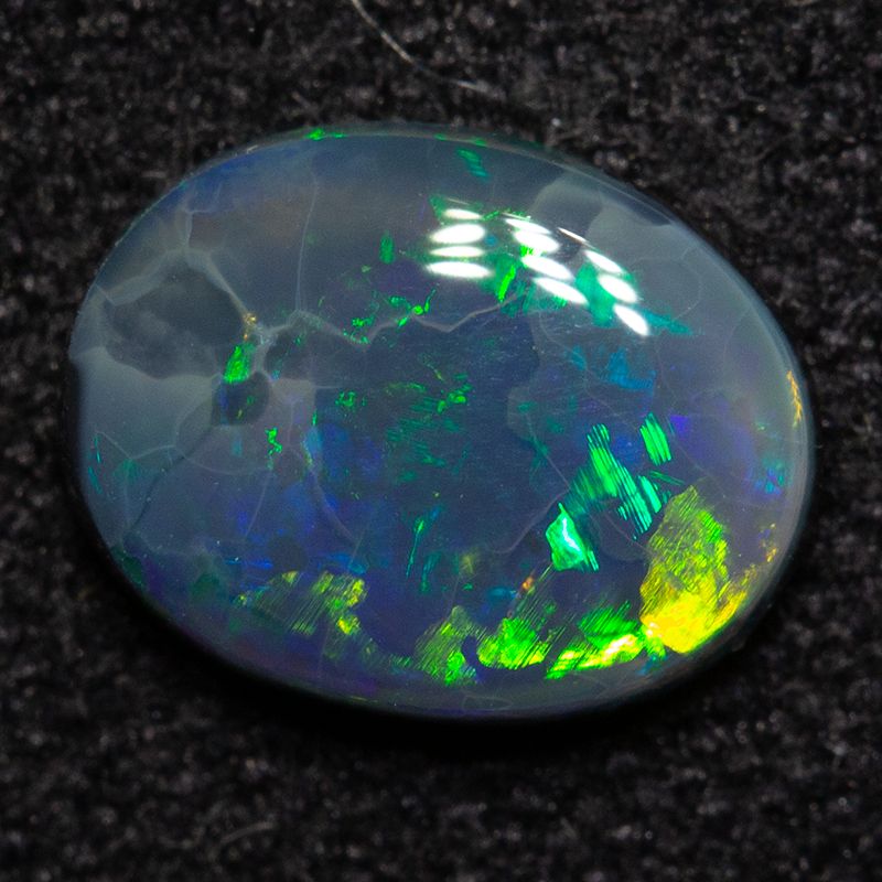 0.66 ct black opal 7.5×5.8×2.2mm No treatment Origin Lighting Ridge, Appraisal: 70.00