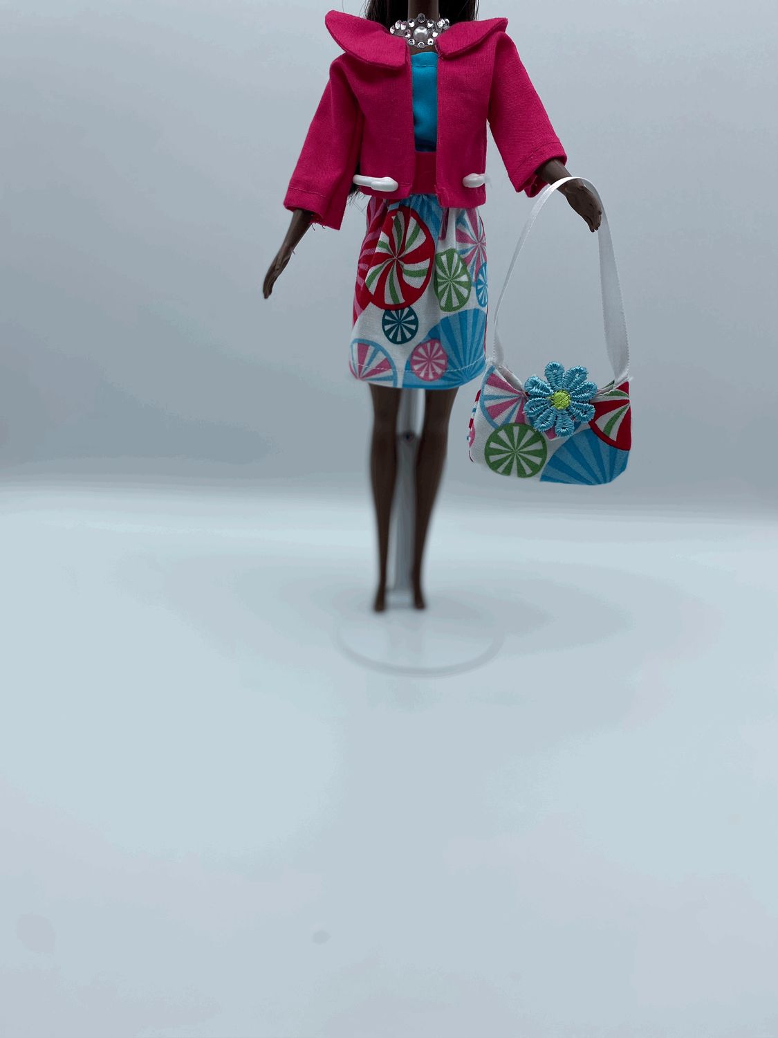 Fashion Doll Fuchsia Blazer and Turquoise Blouse and Circle Print Skirt with Purse