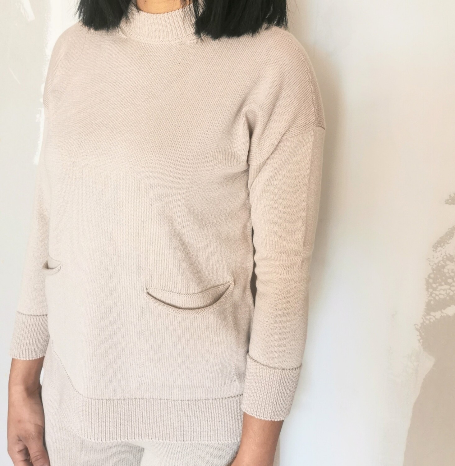 ​Turtleneck sweater with front pockets