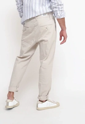​Chino pants in embossed cotton