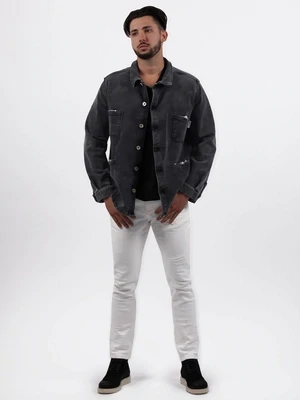 ​​Slim jeans with mending
