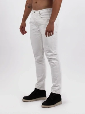 ​​Slim jeans with mending