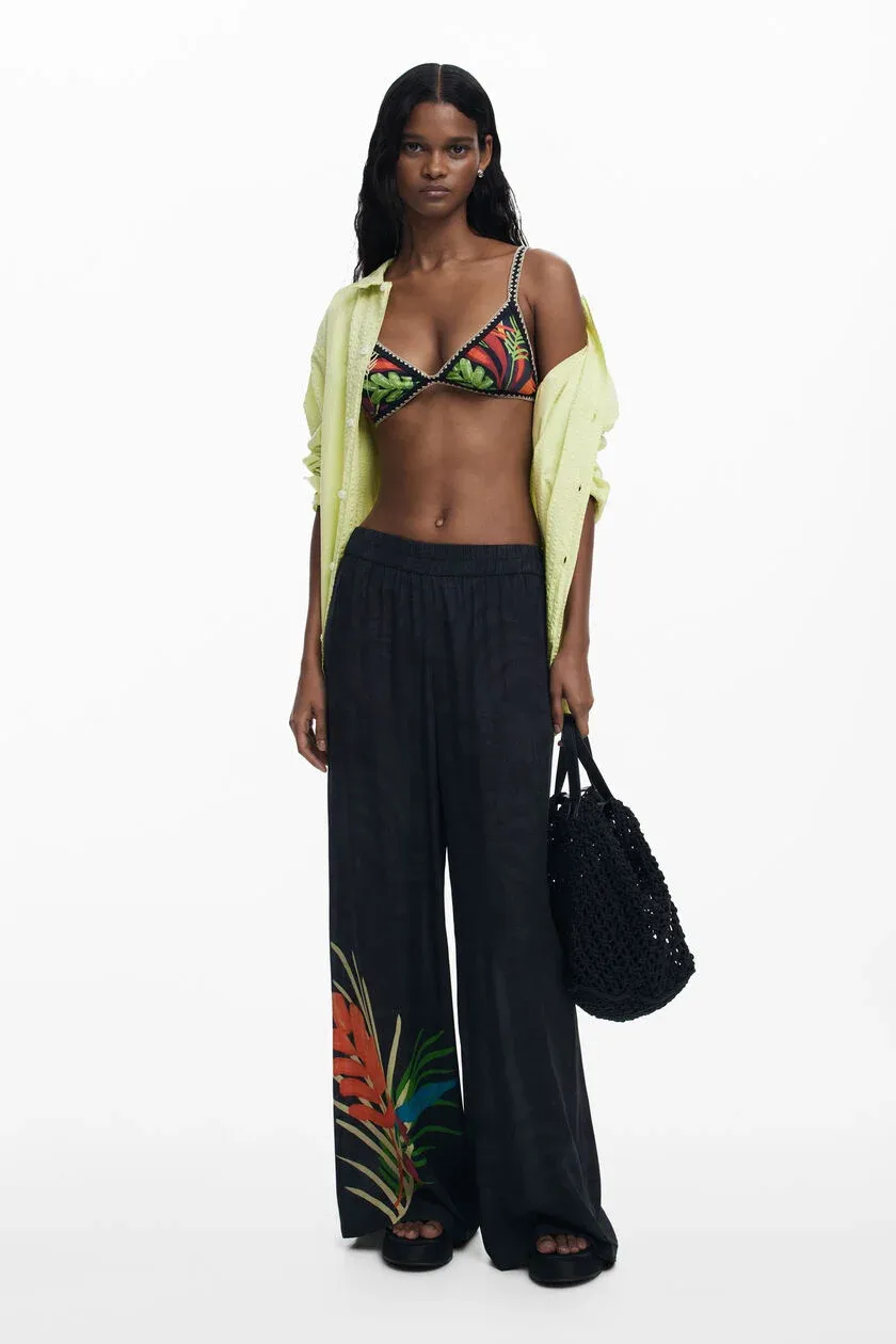 ​​Flare pants with tropical print