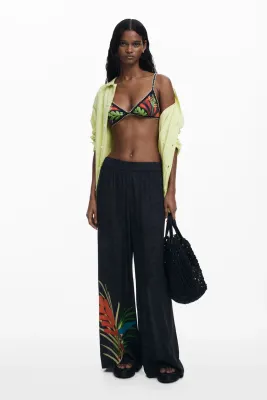 ​​Flare pants with tropical print