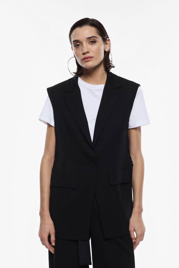 ​​Long vest with single-breasted closure
