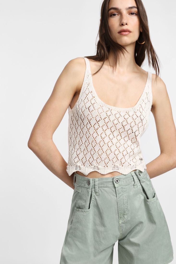 Top with straps and openwork pattern