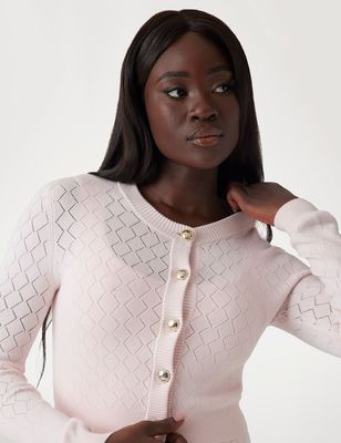 ​Short perforated cardigan