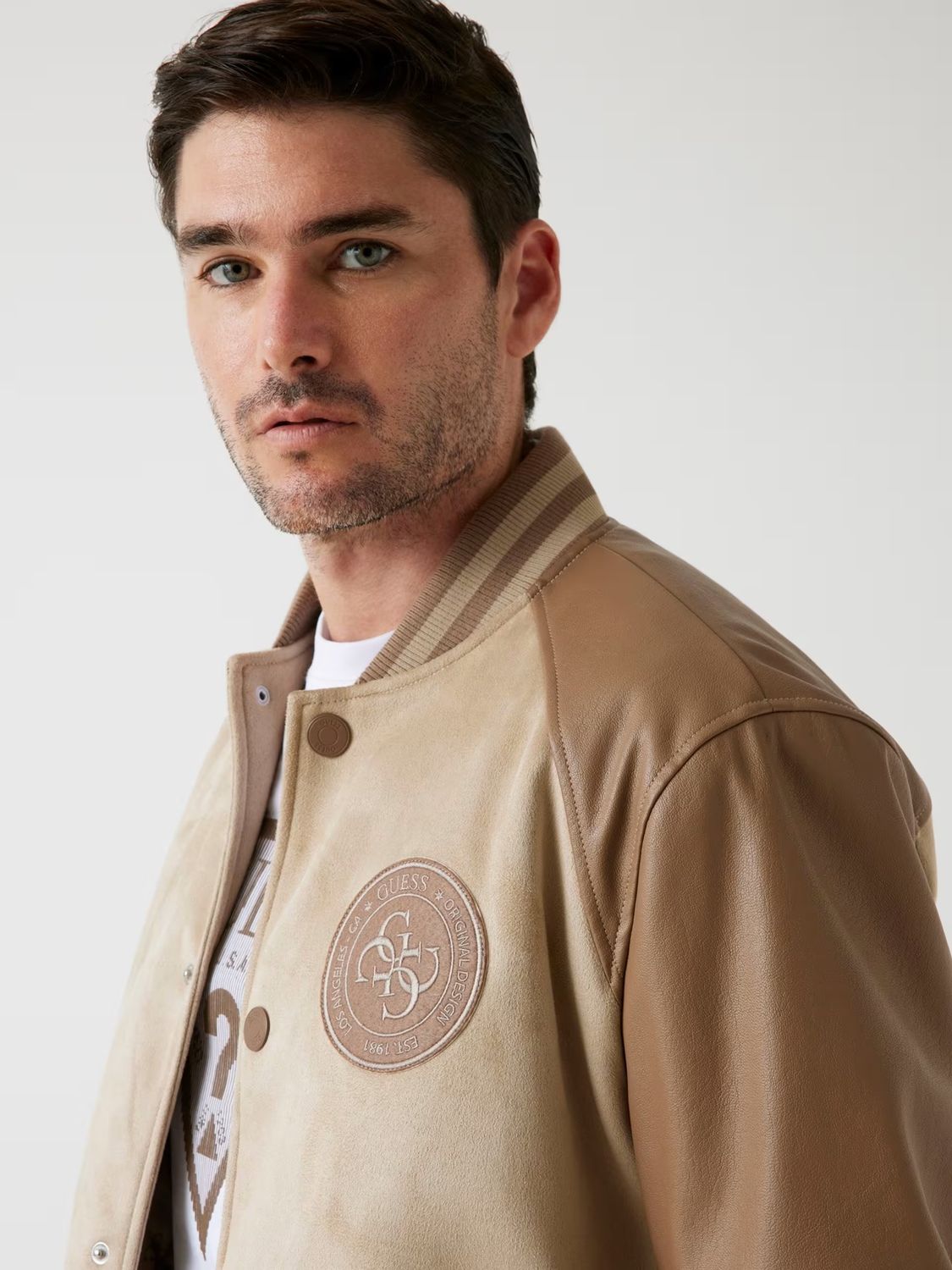 Faux leather bomber jacket with patch