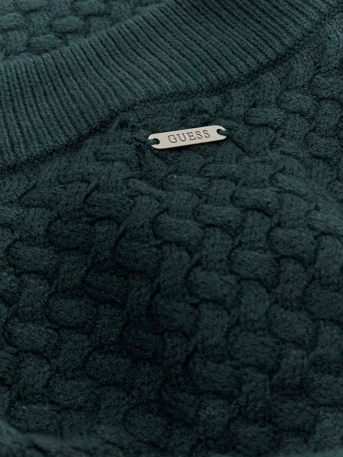 Regular sweater with a woven pattern