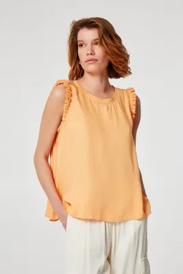 ​Sleeveless satin blouse