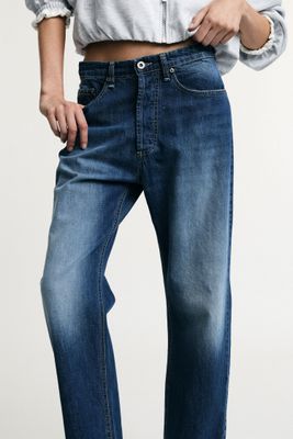 ​Straight-leg jeans with a faded wash