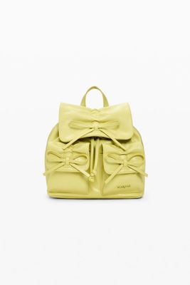 ​Faux leather backpack with decorative bows