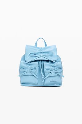 Faux leather backpack with decorative bows