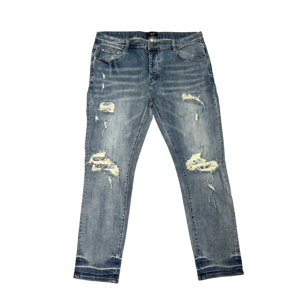 Amiri MX1 Ripped Patch Slim Jeans