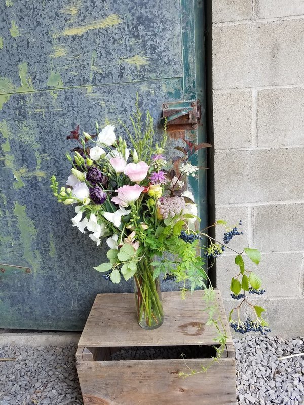Seasonal Arrangement in a glass vase