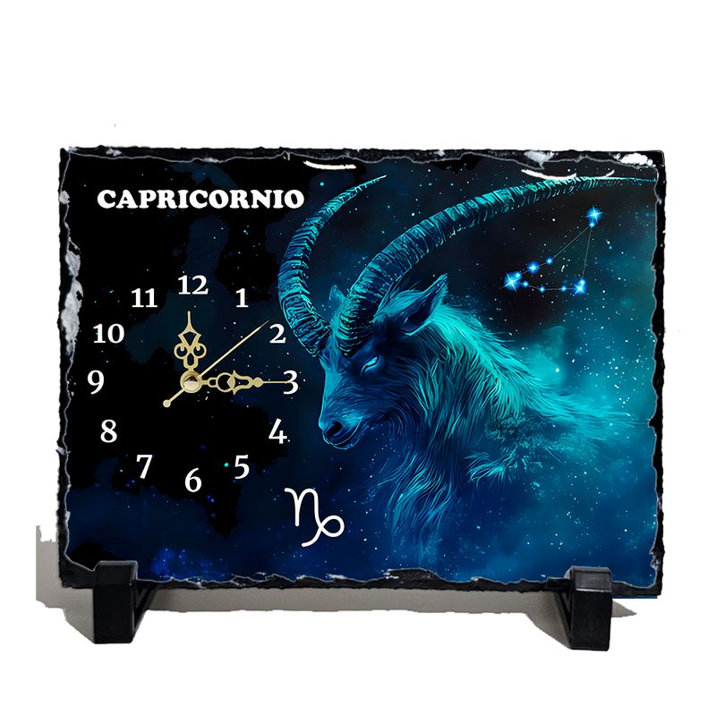 Reloj signo Capricornio en pizarra