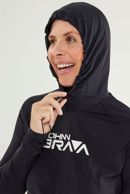 Woman wearing Johnn Brava hooded lycra UV protection top