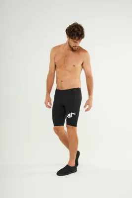 Man wearing Johnn Brava neoprene 1.5mm wetsuit bermuda shorts