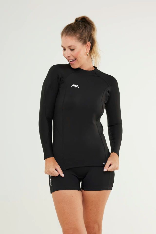 Woman wearing Johnn Brava neoprene 1.5mm wetsuit top