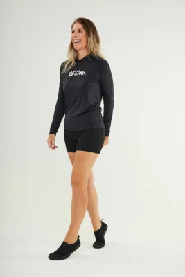Woman wearing Johnn Brava neoprene 1.5mm wetsuit bermuda shorts