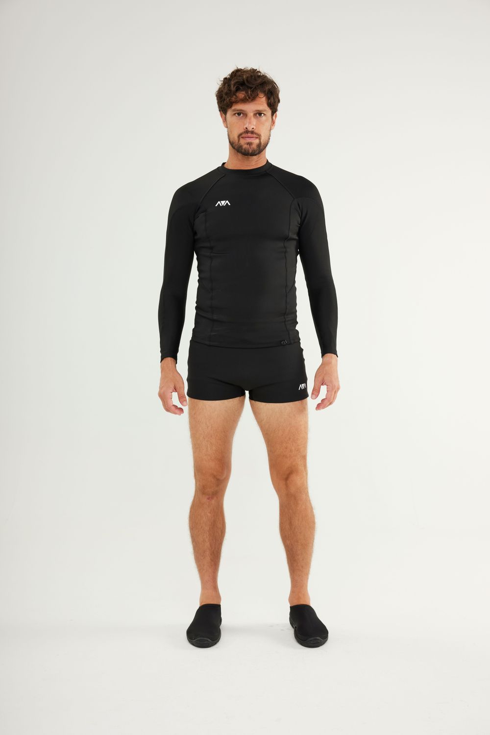 Man wearing Johnn Brava neoprene 1.5mm wetsuit top