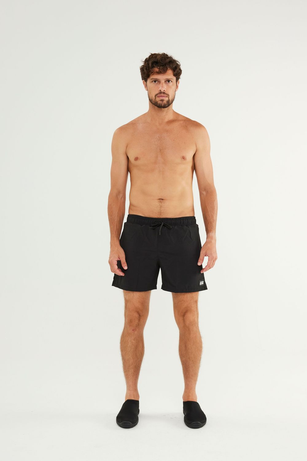 Man wearing Johnn Brava black activewear shorts