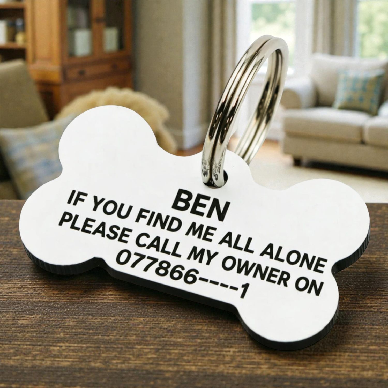 Personalised dog bone pet ID tag engraved in aluminium with name and contact details